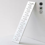 Metallic wavy patterned tray on a light gray background with food safe and dishwasher safe icons.