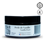 Jar of 'Perle de Vanille' vanilla pearl with a black lid on a white background