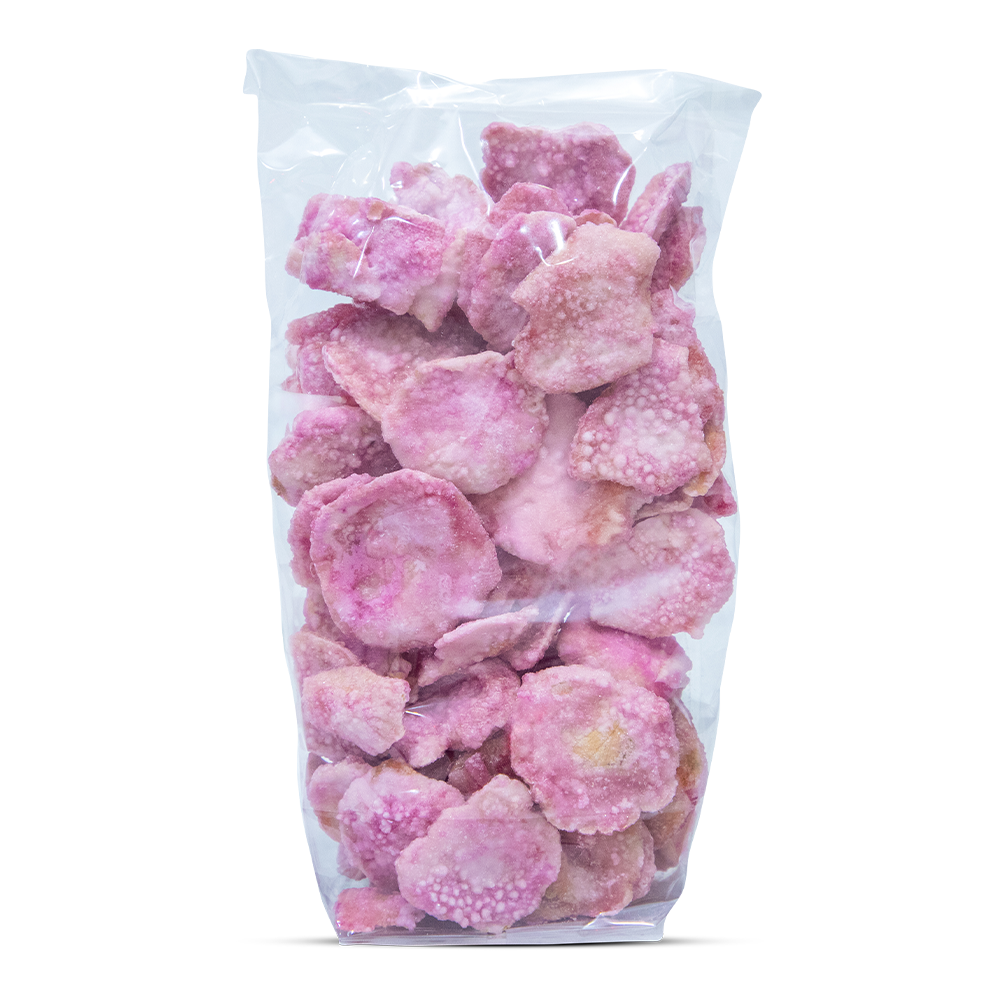 Bag of pink candy pieces on a white background