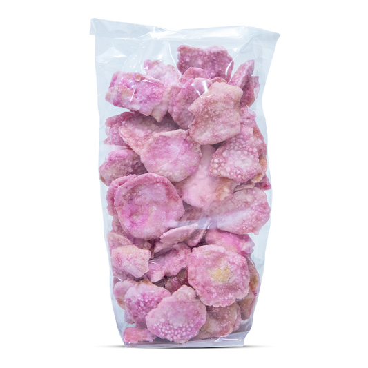 Bag of pink candy pieces on a white background