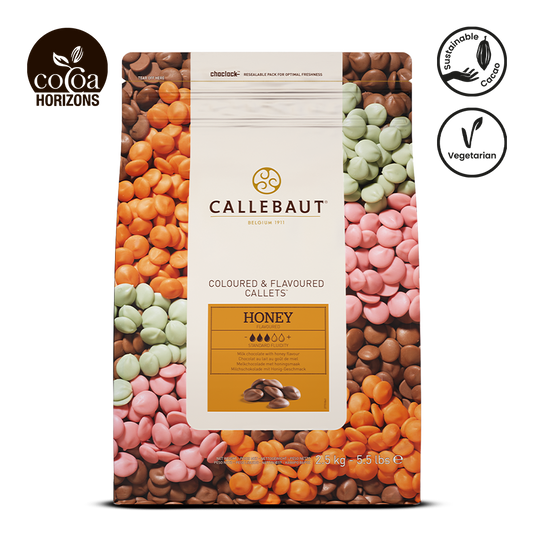 Callebaut colored and flavored chocolate pieces packaging with visible brand logo and product details.