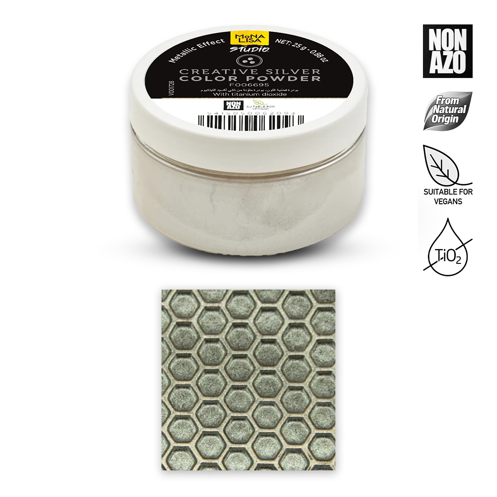 A tub of Rubie's Creative Silver Color Powder shown on a white background, with a small inset swatch of the powder's textured silver-gray appearance below the container.右侧 includes Non-Azo, natural origin, suitable for vegans, and H2O2 certification icons.