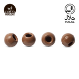 Four brown chocolate balls with 'Cocoa Horizons' and 'Halal' logos on a white background.