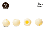 Four spherical bath bombs with a yellow center on a white background, featuring the 'Cocoa Horizons' brand.