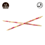 Two twisted candy sticks on a white background with 'Cocoa Horizons' branding.