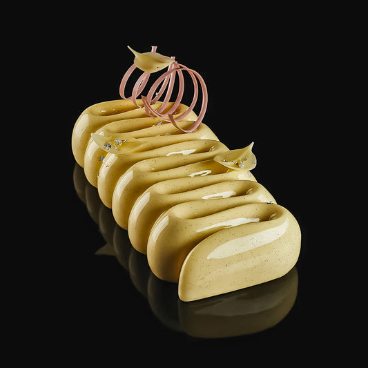 Decorative item resembling a shoe with a pink spiral on a black background