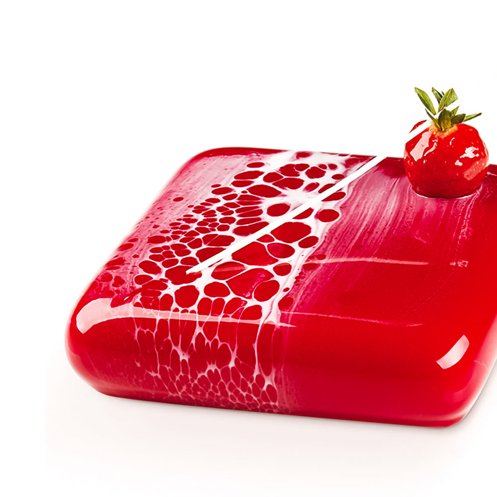 Red and white decorative soap with a strawberry on a white background