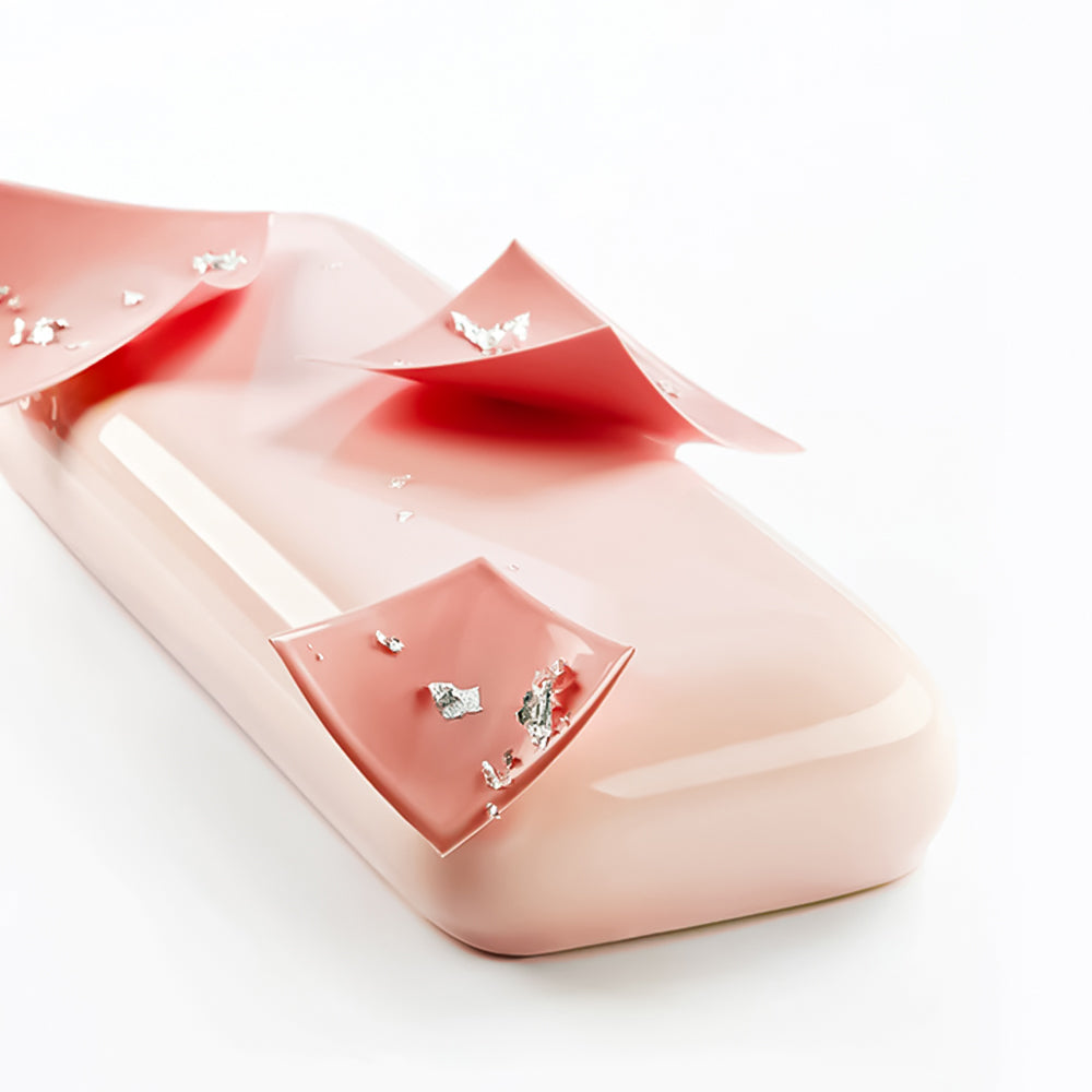 Pink jewelry box with earrings on a white background
