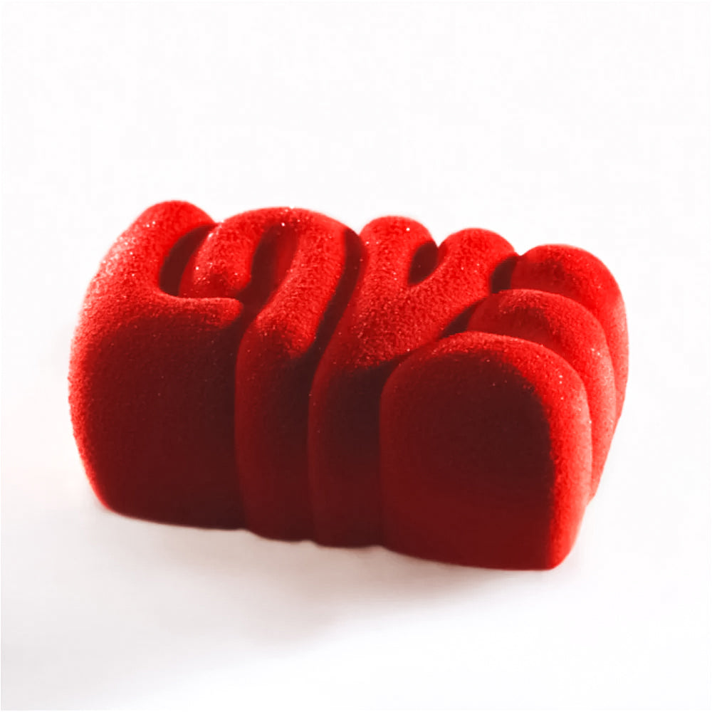 Red foam rollers stacked on a white background