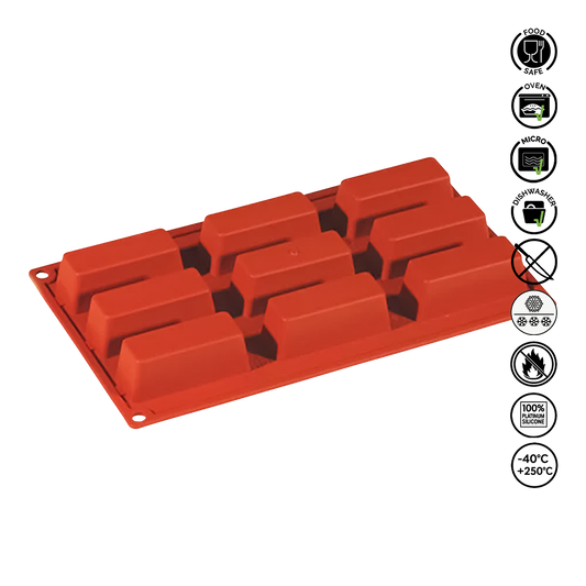 Red silicone mold with multiple compartments on a white background