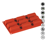 Red silicone mold with multiple compartments on a white background