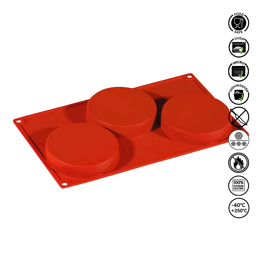 Red silicone mold with three round cavities on a white background