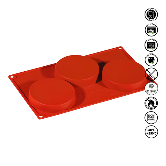 Red silicone mold with three round cavities on a white background