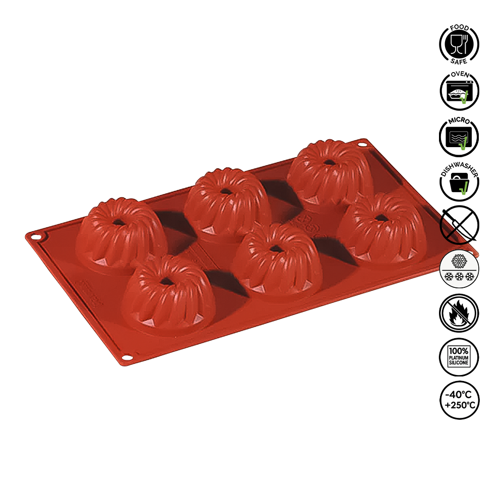 Red silicone mold with pumpkin shapes on a white background