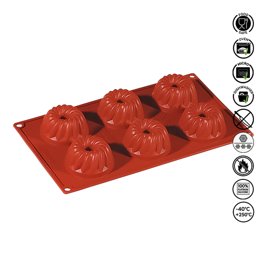 Red silicone mold with pumpkin shapes on a white background