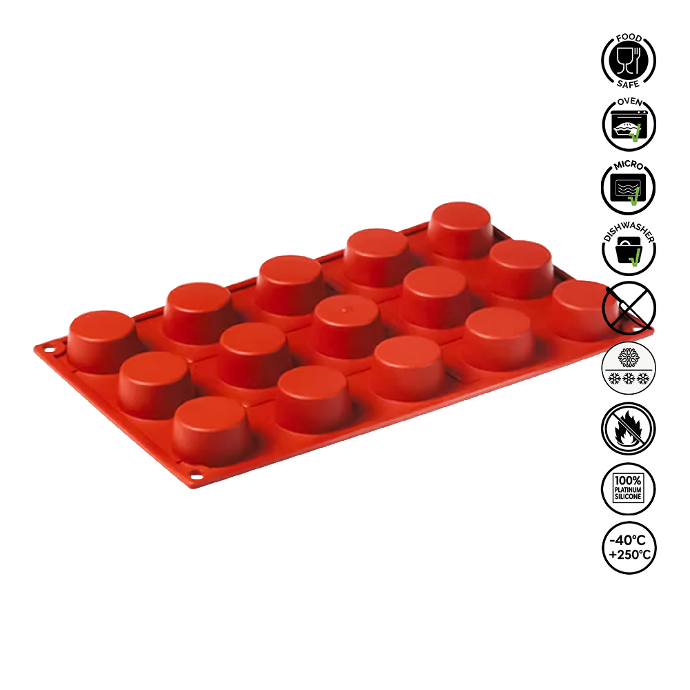 Red silicone mold tray with circular cavities on a white background
