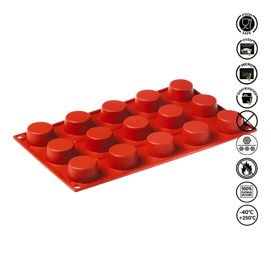 Red silicone mold tray with circular cavities on a white background