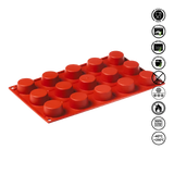 Red silicone mold tray with circular cavities on a white background