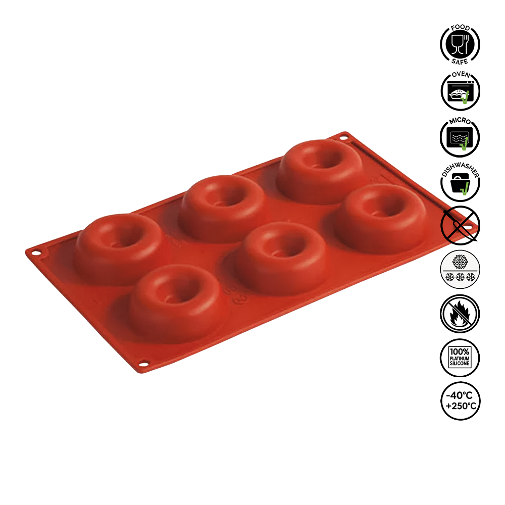 Red silicone donut mold on a white background with safety icons.