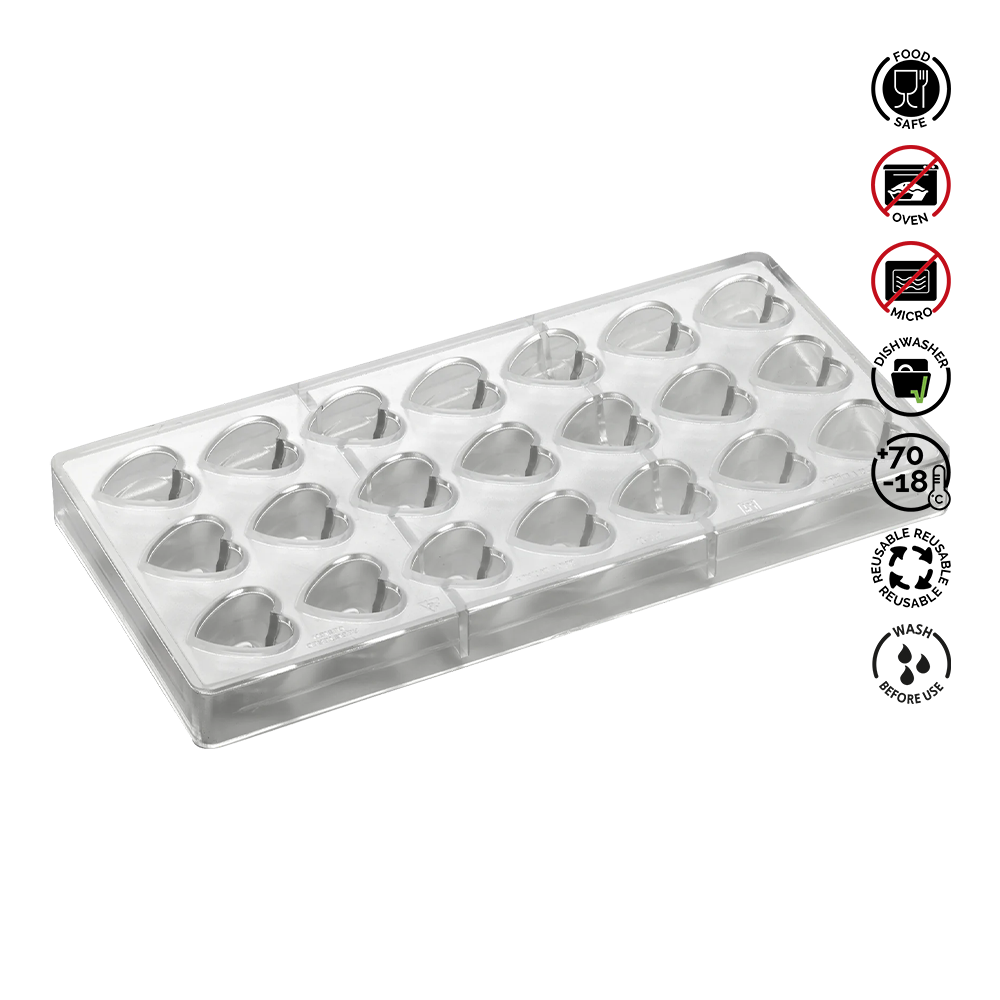 Heart-shaped mold tray with safety symbols on a white background