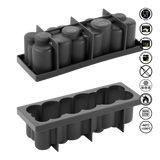 Black silicone ice cube tray with compartments on a white background