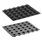 Two black silicone mold trays on a white background