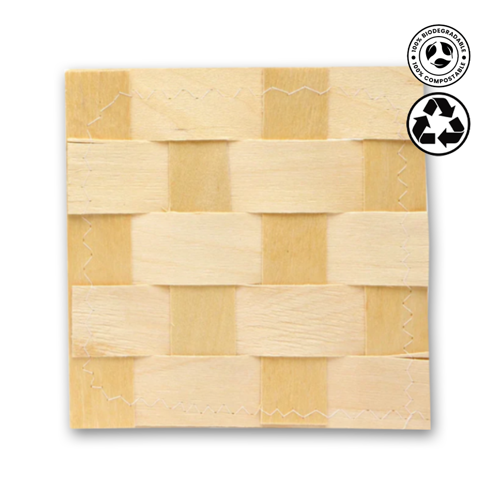 Wooden woven mat with recycling symbols on a white background