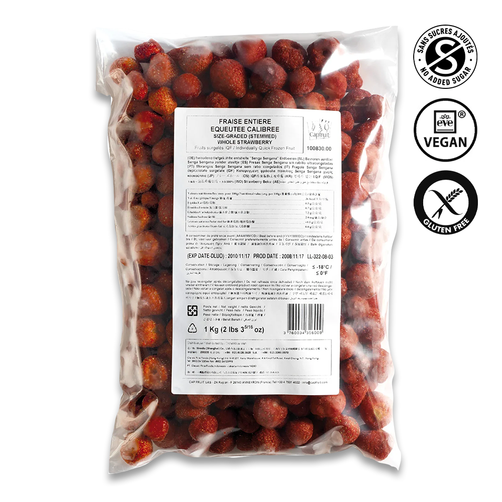Bag of frozen strawberries with a label and certification logos on a white background