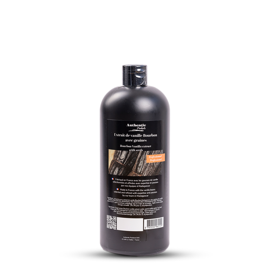 Bottle of vanilla extract with a label on a white background