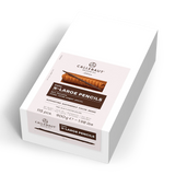 A white rectangular box of Callebaut  X-Large Pencils, shown at an angle on a clean white background. The front label features a light pink background with brown and black text and an illustration of chocolate-dusted cocoa bean pencils.